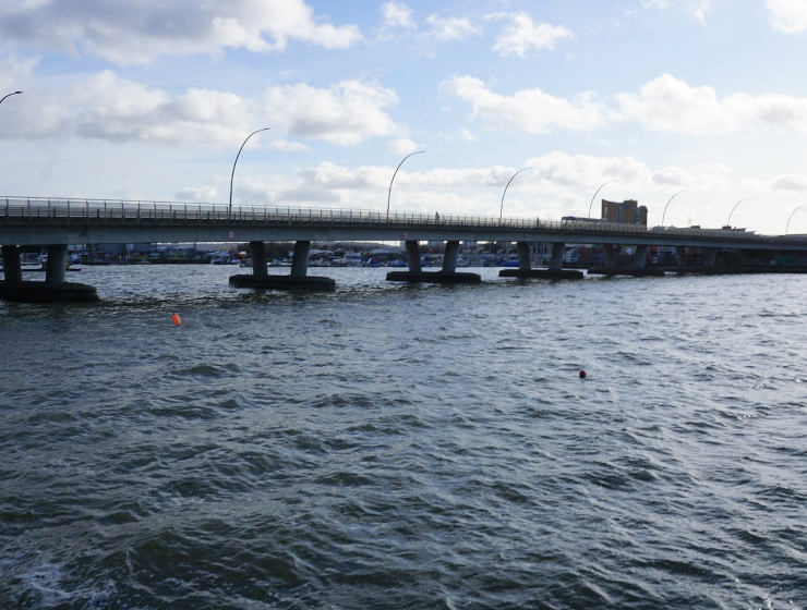 Sir Steve Redgrave Bridge crossing the water in Beckton.