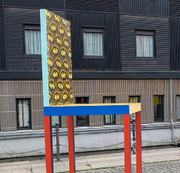 A large decorative sculpture in the shape of a chair.